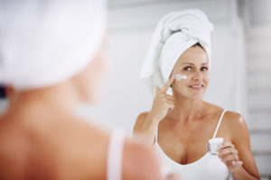 face-cream-application-older-woman