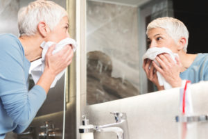 older-woman-washing-face