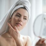 Woman Checking Facial Skin
