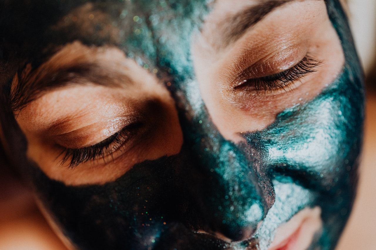 A Face with Green Facial Mask