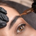 A Woman Undergoing An Eyebrow Microblading Procedure